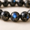 Close-up of authentic natural Larvikite showing crystal texture, colour and craftsmanship