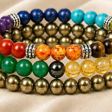 Load image into Gallery viewer, Close-up of authentic natural 7 Chakra and Pyrite showing crystal texture, colour and craftsmanship – money attraction combo 3 crystal bracelets pyrite 7chakra

