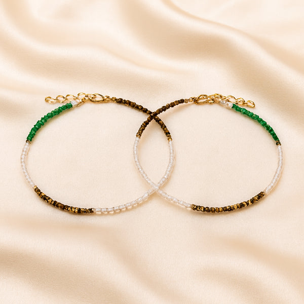 Money Magnet Anklet Pack displayed fully on white silk cloth to show its natural colour, shape and finish