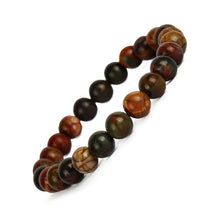 Load image into Gallery viewer, Multi Picasso Jasper Bracelet displayed fully on white silk cloth to show its natural colour, shape and finish
