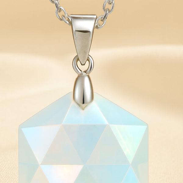 Close-up of authentic natural Opal showing crystal texture, colour and craftsmanship – opal hexagon pendant symbol of spark hope and luxury perfect