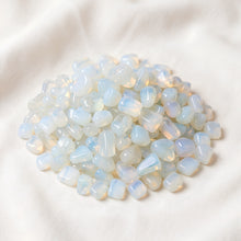 Load image into Gallery viewer, Opalite Chips displayed fully on white silk cloth to show its natural colour, shape and finish
