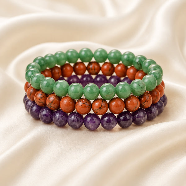 Wealth & Prosperity Bracelet Combo displayed fully on white silk cloth to show its natural colour, shape and finish