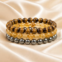 Load image into Gallery viewer, Career Growth Bracelet Combo displayed fully on white silk cloth to show its natural colour, shape and finish

