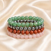 Growth & Balance Bracelet Pack displayed fully on white silk cloth to show its natural colour, shape and finish