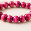 Close-up of authentic natural Pink Tiger Eye showing crystal texture, colour and craftsmanship