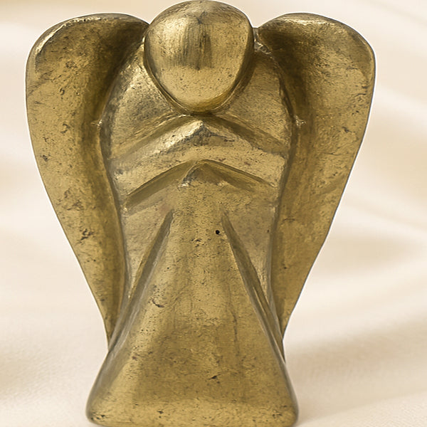 Close-up of authentic natural Pyrite showing crystal texture, colour and craftsmanship – pyrite angel symbol of abundance confidence and divine guidance perfect