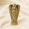 Pyrite Angel Figurine displayed fully on white silk cloth to show its natural colour, shape and finish