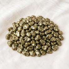 Load image into Gallery viewer, Pyrite Chips displayed fully on white silk cloth to show its natural colour, shape and finish
