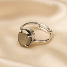 Load image into Gallery viewer, Pyrite Adjustable Ring displayed fully on white silk cloth to show its natural colour, shape and finish – pyrite ring adjustable symbol of abundance confidence
