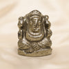 Pyrite Ganesh Idol displayed fully on white silk cloth to show its natural colour, shape and finish