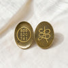 Pyrite Zibu Coin displayed fully on white silk cloth to show its natural colour, shape and finish