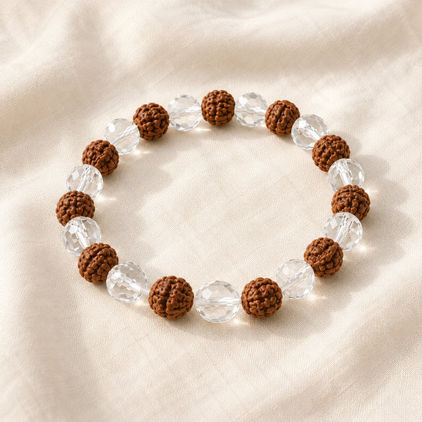 Clear Quartz & Rudraksha displayed fully on white silk cloth to show its natural colour, shape and finish
