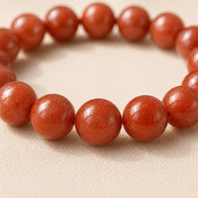 Load image into Gallery viewer, Close-up of authentic natural Red Aventurine showing crystal texture, colour and craftsmanship
