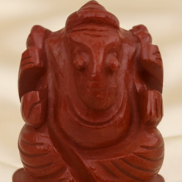 Close-up of authentic natural Red Jasper showing crystal texture, colour and craftsmanship – red jasper ganesh symbol of strength stability and grounding energy