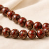 Close-up of authentic natural Picasso Jasper showing crystal texture, colour and craftsmanship