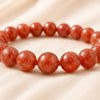 Close-up of authentic natural Red Sunstone showing crystal texture, colour and craftsmanship