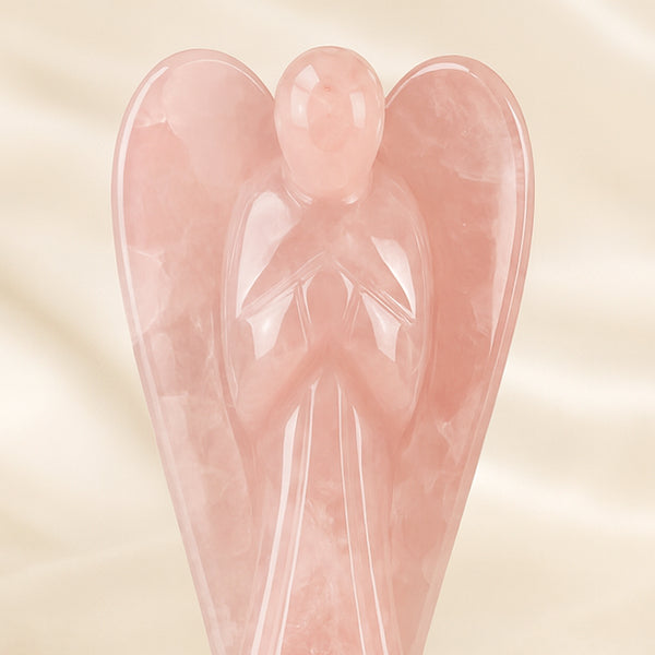 Close-up of authentic natural Rose Quartz showing crystal texture, colour and craftsmanship – rose quartz angel symbol of love compassion and emotional healing