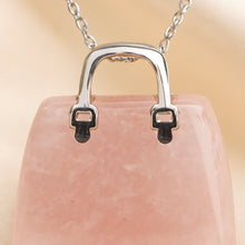 Load image into Gallery viewer, Close-up of authentic natural Rose Quartz showing crystal texture, colour and craftsmanship – rose quartz mini handbag pendant symbol of love gentleness and
