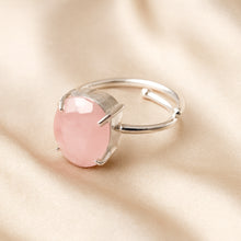 Load image into Gallery viewer, Rose Quartz Adjustable Ring displayed fully on white silk cloth to show its natural colour, shape and finish
