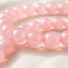 Load image into Gallery viewer, Close-up of authentic natural Rose Quartz showing crystal texture, colour and craftsmanship – rose quartz stone bracelet love healing harmony positivity evashu
