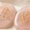 Close-up of authentic natural Rose Quartz showing crystal texture, colour and craftsmanship – rose quartz zibu coin healing crystal for love healing positivity