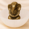 Close-up of authentic natural Selenite and Pyrite showing crystal texture, colour and craftsmanship – selenite bowl and pyrite ganesh set symbols of purity