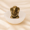 Selenite Bowl + Pyrite Ganesh Bowl displayed fully on white silk cloth to show its natural colour, shape and finish
