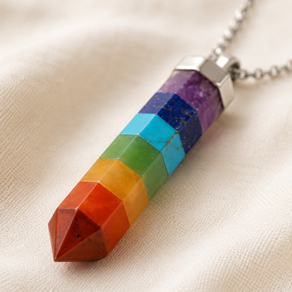 Close-up of authentic natural 7 Chakra showing crystal texture, colour and craftsmanship – seven chakra pencil pendant chain healing crystal for energy and