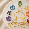 Close-up of authentic natural 7 Chakra and Selenite showing crystal texture, colour and craftsmanship – seven chakra selenite charging plate engraved energy