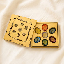 Load image into Gallery viewer, Crystal Zibu Coin Set displayed fully on white silk cloth to show its natural colour, shape and finish
