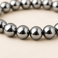 Load image into Gallery viewer, Close-up of authentic natural Hematite showing crystal texture, colour and craftsmanship
