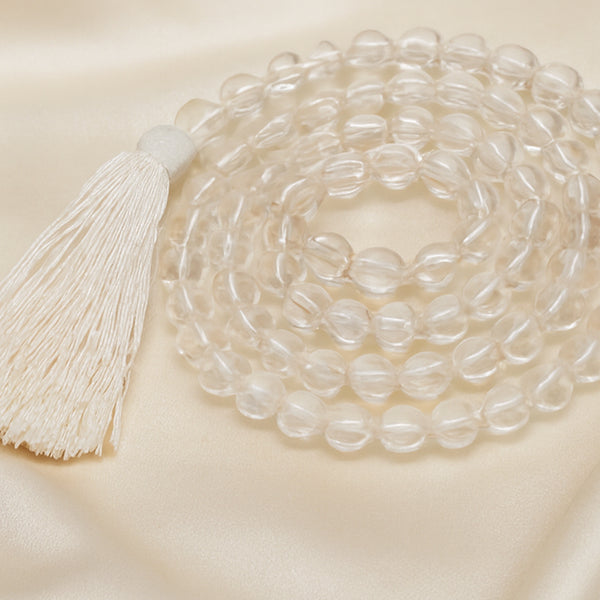 Close-up of authentic natural Clear Quartz and Sphatik showing crystal texture, colour and craftsmanship – sphatik clear quartz 6mm japmala 108 beads symbol of