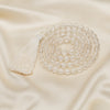 Sphatik Japmala 6mm Japmala displayed fully on white silk cloth to show its natural colour, shape and finish