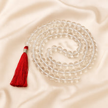 Load image into Gallery viewer, Sphatik Japmala 8mm Japmala displayed fully on white silk cloth to show its natural colour, shape and finish
