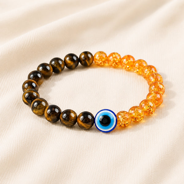 Close-up of authentic natural Tiger Eye, Evil Eye and Citrine showing crystal texture, colour and craftsmanship