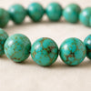 Close-up of authentic natural Turquoise showing crystal texture, colour and craftsmanship