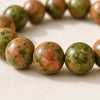 Close-up of authentic natural Unakite showing crystal texture, colour and craftsmanship