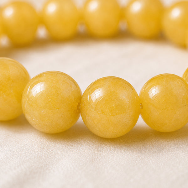 Close-up of authentic natural Yellow Aventurine showing crystal texture, colour and craftsmanship