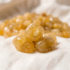Close-up of authentic natural Yellow Aventurine showing crystal texture, colour and craftsmanship – yellow aventurine chips stone symbol of self esteem optimism