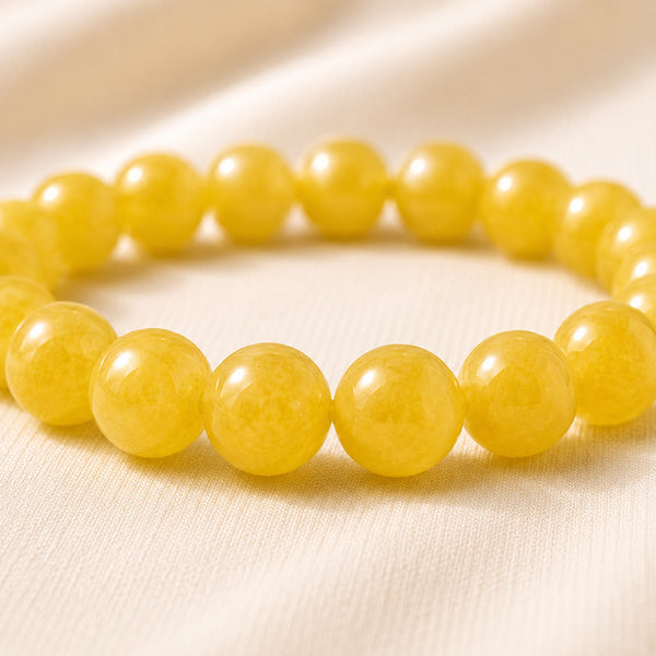 Close-up of authentic natural Yellow Jade showing crystal texture, colour and craftsmanship