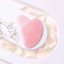 Load image into Gallery viewer, Rose Quartz Gua Sha tool for face care, promoting smooth skin, radiance, and loving energy.
