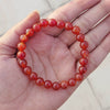 A collection of Carnelian bracelet showcasing different styles and sizes along with their Carnelian bracelet benefits.