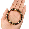 Natural Golden Pyrite Bracelet & Golden Pyrite Tree Combo Set – For Wealth, Prosperity, Growth & Protection - On Hand View | Natural Pyrite Crystal Bracelet for Evil Eye Protection & Negative Energy Shield