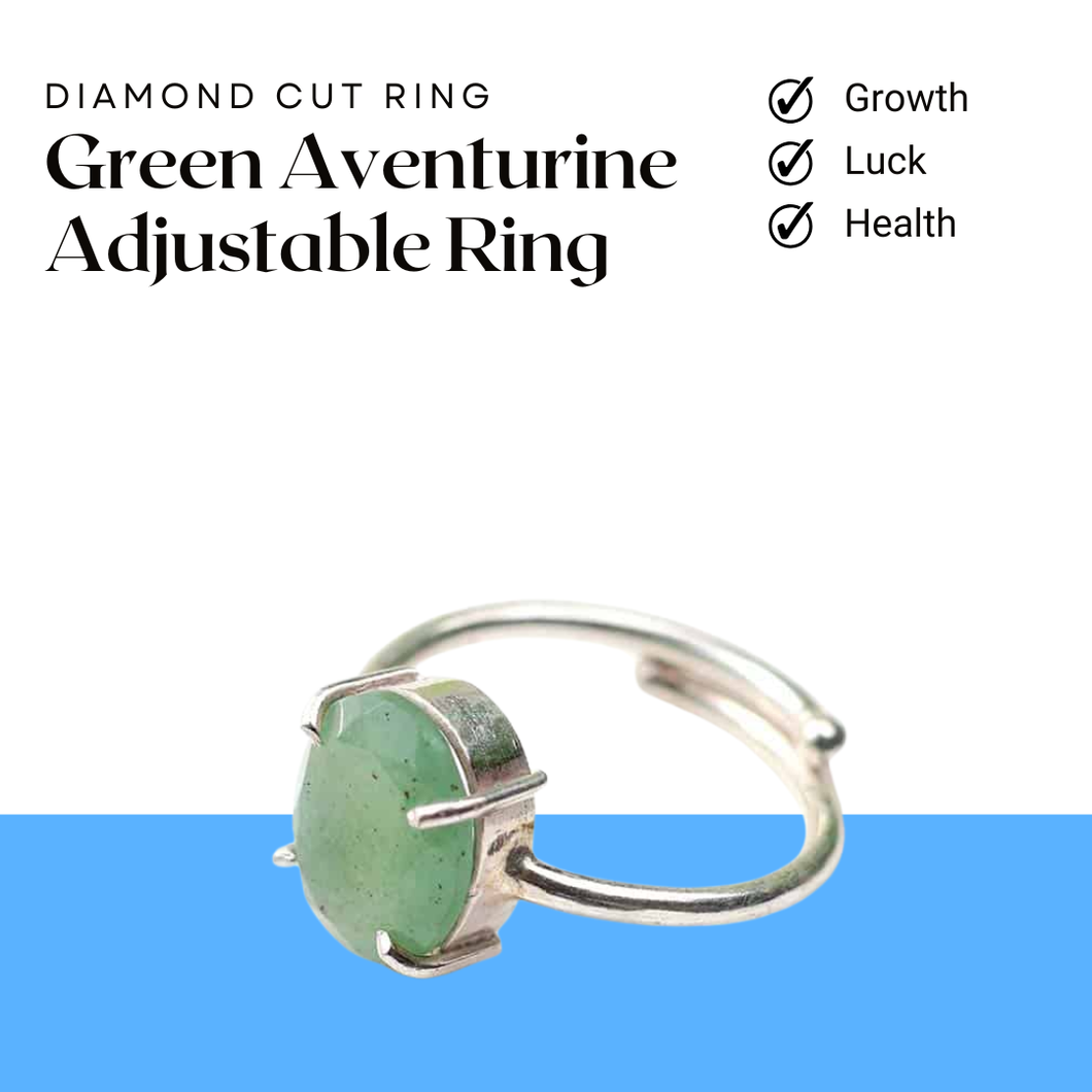 Green Aventurine diamond cut oval ring on minimalist white and blue background for luck, prosperity and emotional healing.