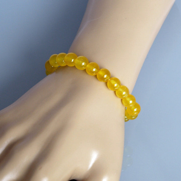 A collection of Yellow Jade bracelet showcasing different styles and sizes along with their Yellow Jade bracelet benefits.