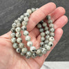 A collection of Kiwi Jasper bracelet showcasing different styles and sizes along with their Kiwi Jasper bracelet benefits.