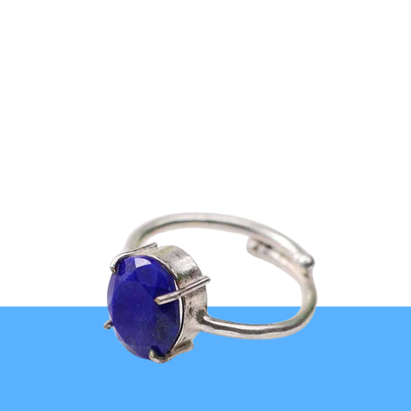 Diamond-cut Lapis Lazuli gemstone ring featuring natural golden flecks and a polished metal band.