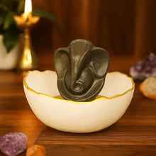 Load image into Gallery viewer, Front close-up view of a Lord Ganesha decorative showpiece in a white bowl

