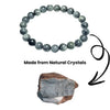 Natural grey crystal bead bracelet with polished round stones.